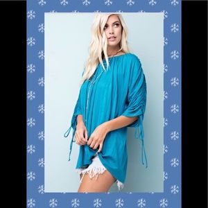 Dolman top with gathered long sleeve